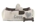 Legowisko dla psa Coco z sercem i kością. Czy pies drapie legowisko, bo chce je ułożyć?