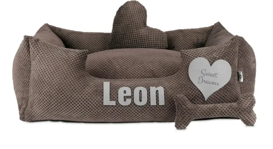 Wygodne legowisko dla doga niemieckiego Leona, z sercem "Sweet Dreams" i kością.